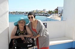 Older and younger woman with Nitro rollator and ocean background