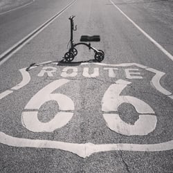 Knee Walker sitting on Route 66 sign